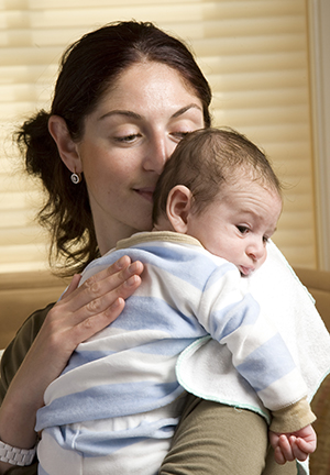 Mother holding newborn baby