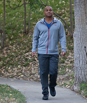 Man walking outdoors.